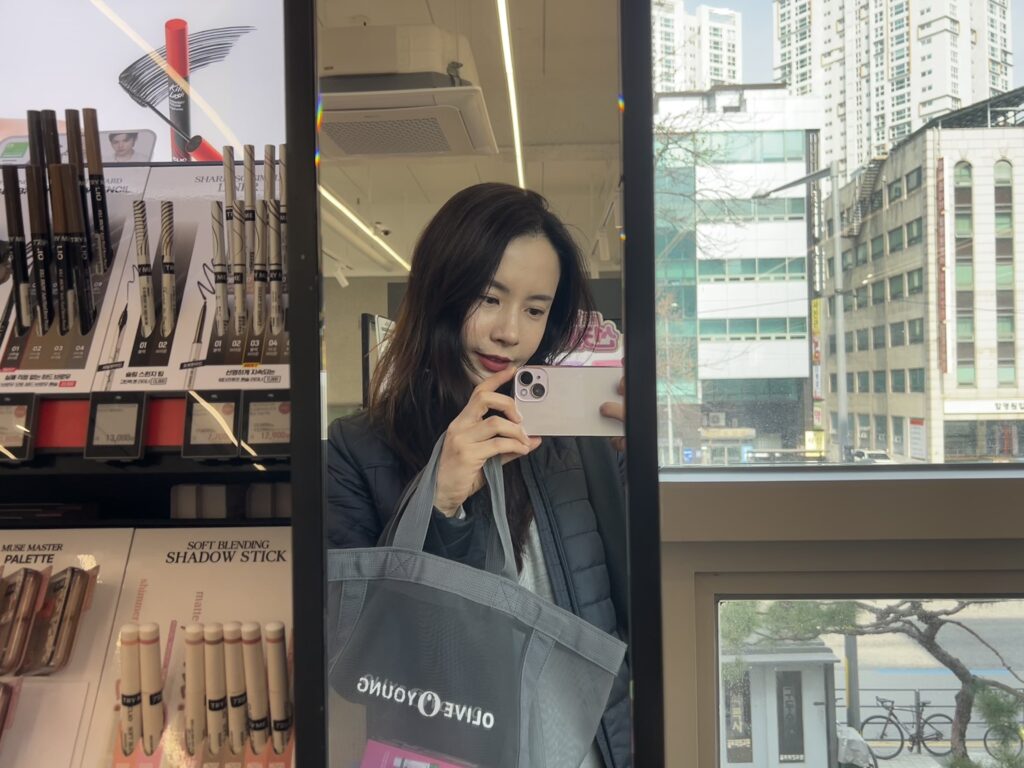 Selfie with a makeup using one of 3CE Cashmere Hug Lipstick, 07 Knit color