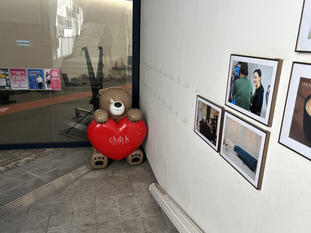 The modern exterior of Club K Seoul, a premium Korean Jjimjilbang and spa located in the heart of Gangnam, Seoul.