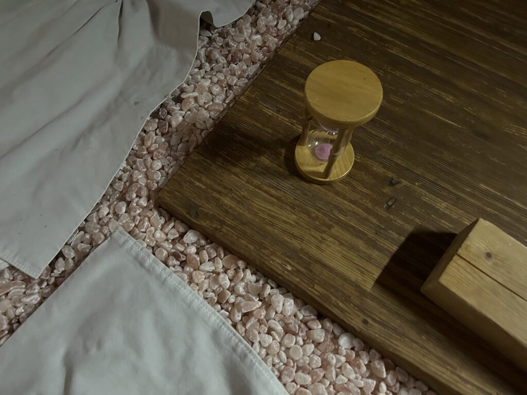 Interior of Club K Seoul, a premium Korean Jjimjilbang in Gangnam, featuring a glowing Himalayan salt room