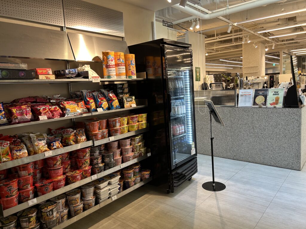 Interior of Club K Seoul, a premium Korean Jjimjilbang in Gangnam, featuring a snack bar.