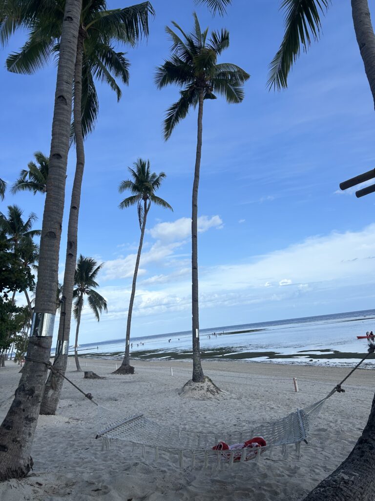Panoramic view of the longest private white sand beach in Bohol at South Palms Resort Panglao MGallery.
