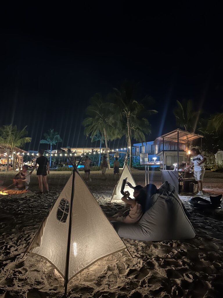 Nighttime view of South Palms white sand beach, transformed into a stargazing and constellation-hunting activity spot for kids.