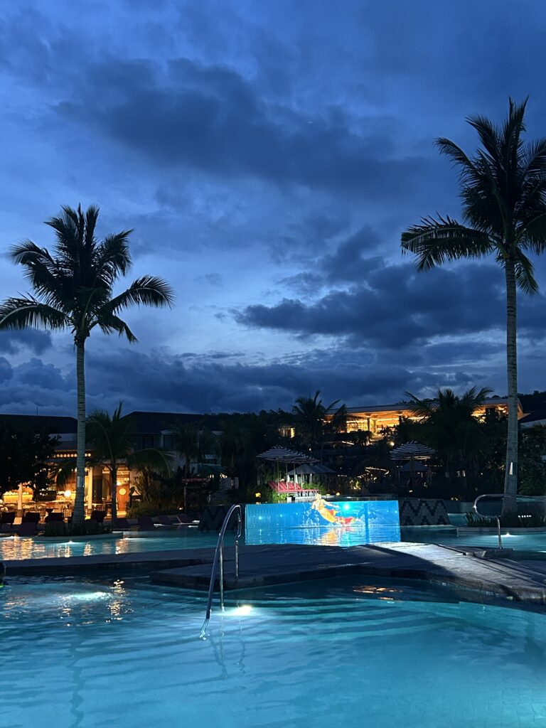 Nightlife entertainment at South Palms Resort Panglao MGallery featuring a mermaid performance.