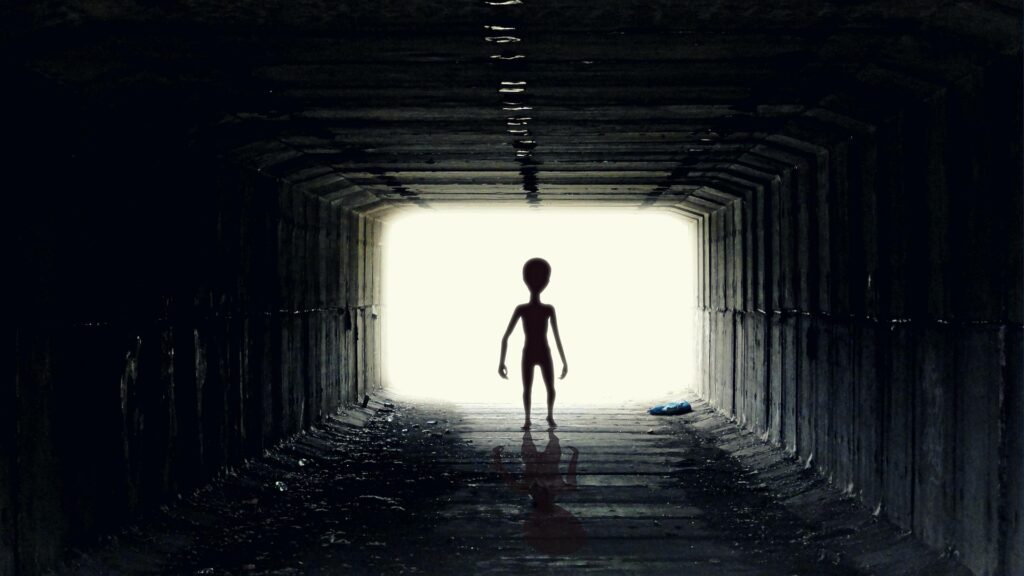 An illustration of an alien representing BTS’s song 'Aliens' and feelings of being an outsider in mainstream society